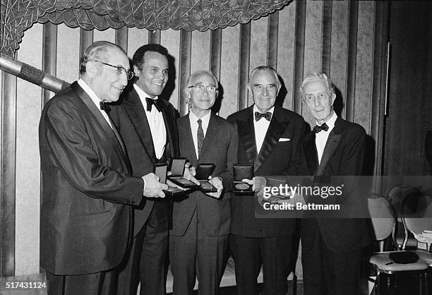 Recipients of the 1972 Albert Einstein Commemorative Awards display their medallions after being honored here late on May 7th. The awards are...