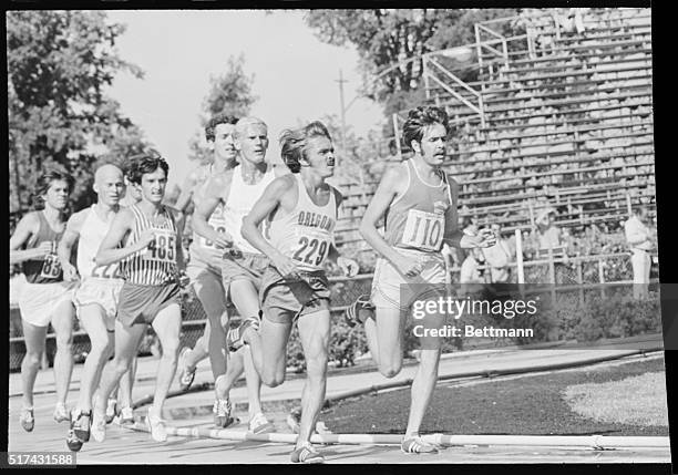 Olympic Trails - Eugene, Ore: Steve Prefontaine of the University of Oregon leads the pack around one of the later turns in the 5,000 meter first...