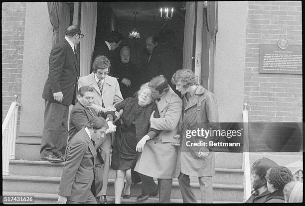 New York: With anguished crys of "My Baby! My Baby!, " Joseph "Crazy Joe" Gallo's Mother is helped from a Brooklyn funeral home by an unidentified...