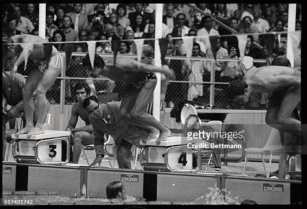 America's Mark Spitz of Carmichael, California, leaves the block at the start of the third leg of the Olympic 4X100 meter men's medley relay...