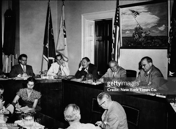 Members of the House Committee on Un-American Activities sit for an executive meeting, Washington DC, August 8, 1948. From left, future American...