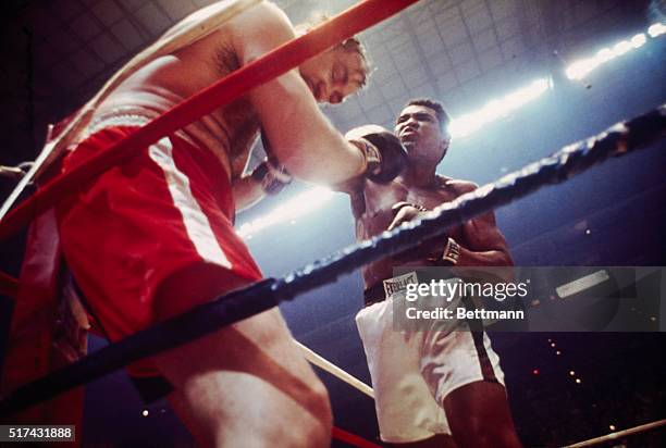 Heavyweight champion Muhammad Ali hits Chuck Wepner against the ropes in the 9th round of their title bout here.