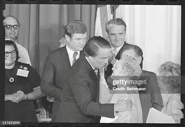 Washington: R. Sargent Shriver gets a pat on the cheek from his 90-year-old mother, after he won overwhelming approval from the Democratic National...