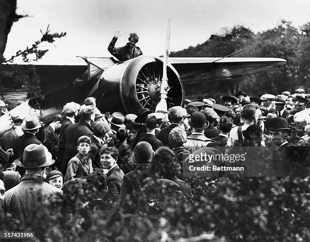 Londonderry: Newfoundland To Ireland Flight. Amelia Earhart Putnam, waving to admiring crowd after her arrival at Londonderry, Ireland.