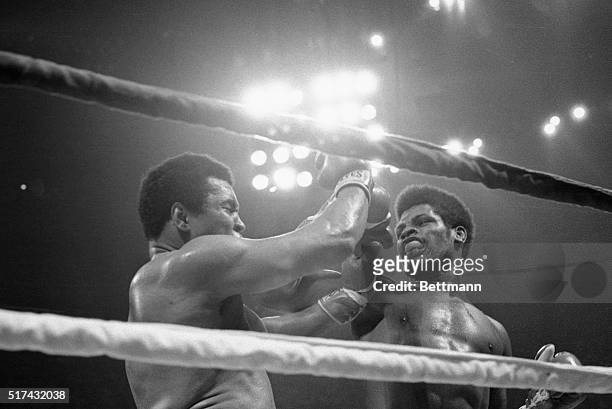 Leon Spinks rips a hard right to the face of Muhammad Ali during their fight in the Superdome 9/15.