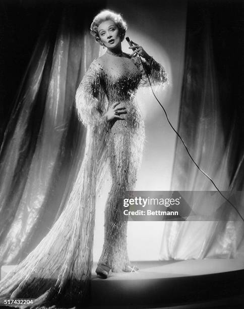 Full length photograph of actress and cabaret singer, Marlene Dietrich. Undated photograph.