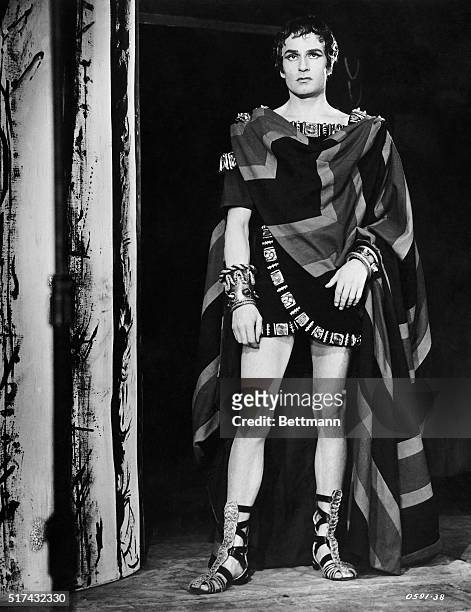 Laurence Olivier appears as the doomed King Oedipus in a theatrical performance of Sophocles' "Oedipus Rex." Oilvier wears an ancient Greek costume...