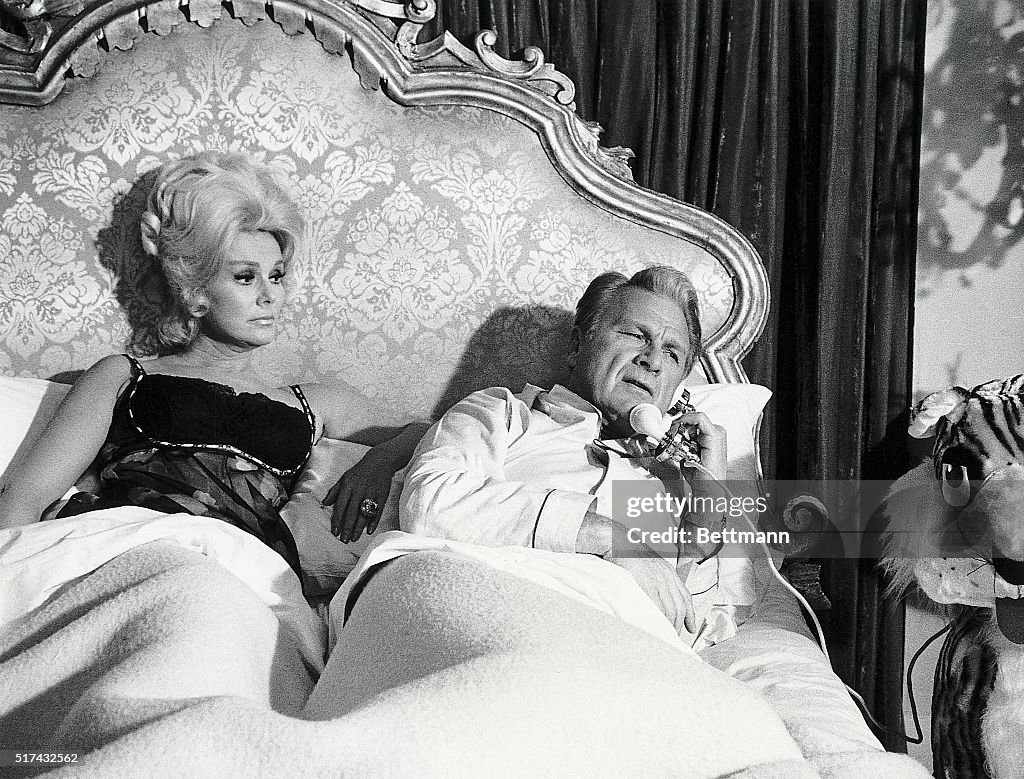 Eva Gabor And Eddie Albert Laying In Bed