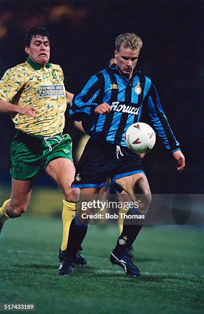 Robert Newman of Norwich City, and Dennis Bergkamp of Inter Milan during a UEFA Cup Third round First leg match at Carrow Road, Norwich, 24th...