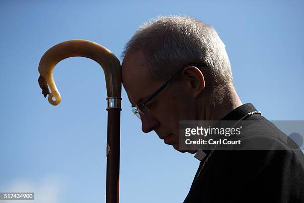 The Arch-Bishop of Canterbury listens to a service after a March of Witness through the town centre on March 25, 2016 in Sittingbourne, England....