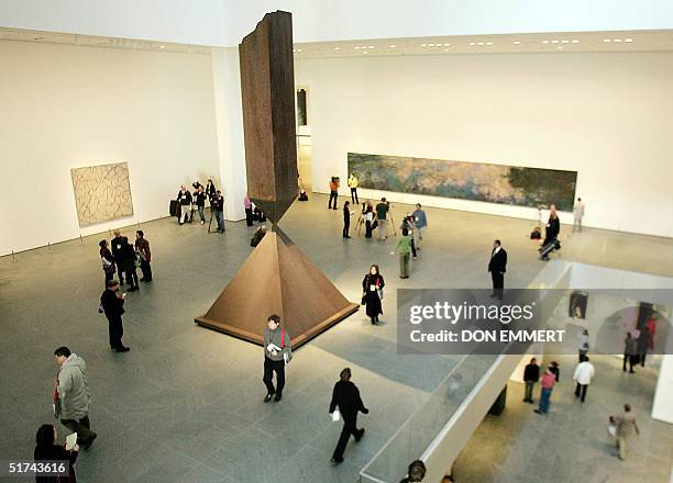 Barnett Newman's "Broken Obelisk" is shown on the second floor atrium of the Museum of Modern Art 15 November, 2004 in New York. The museum reopens...