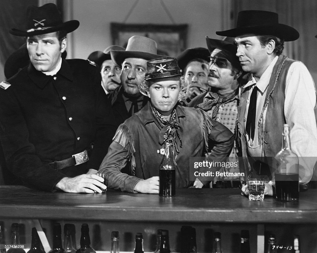 Doris Day, Howard Keel and Philip Carey in Movie Still