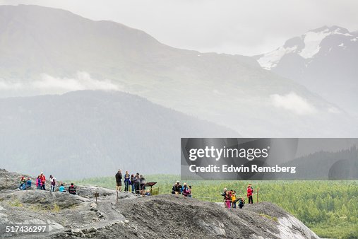 Tourists observing landscape Tourists observing landscape