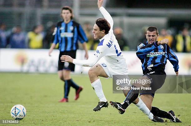 Daniele Mannini of Brescia is taken down by a tackle during the Serie A match between Atalanta and Brescia on November 14, 2004 in Bergamo, Italy.