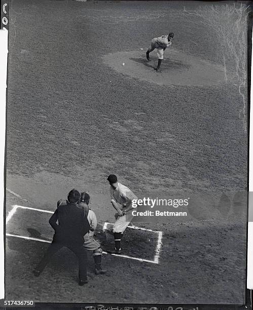 In the pitchers box here is Lynwood Schoolboy Rowe of Detroit in the act of putting himself in the charmed circle with Smoky Joe Wood, Walter...