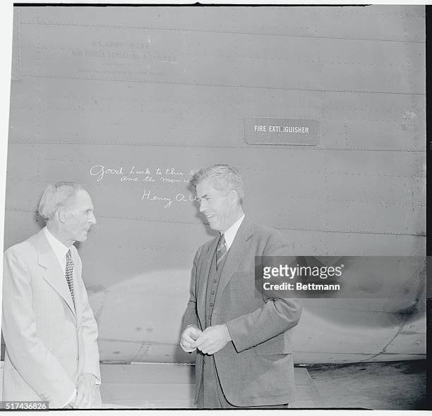 More wings for freedom...Henry Ford , and vice president Henry Wallace, tour the gigantic Willow Run bomber plant. Wallace has just given this big...