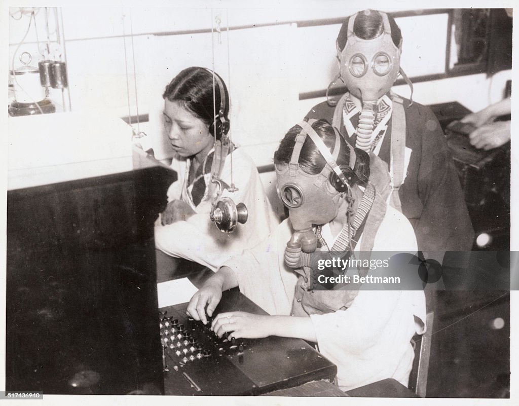 Workers Wearing Gas Masks