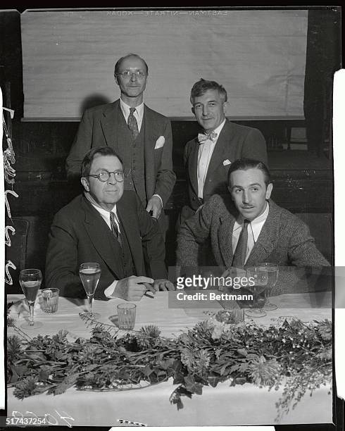 The first annual cartoonists dinner of the year, sponsored by Walt Disney, Mickey Mouse artist. Left to right, top, Donald Ogden Stewart, Willie...