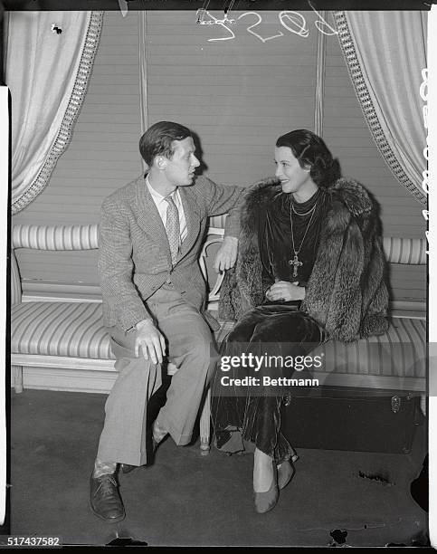 Kitty Carlisle, screen actress, has been seen about Hollywood often with Christian Boussus, tennis player of France and Hollywood is wondering if...