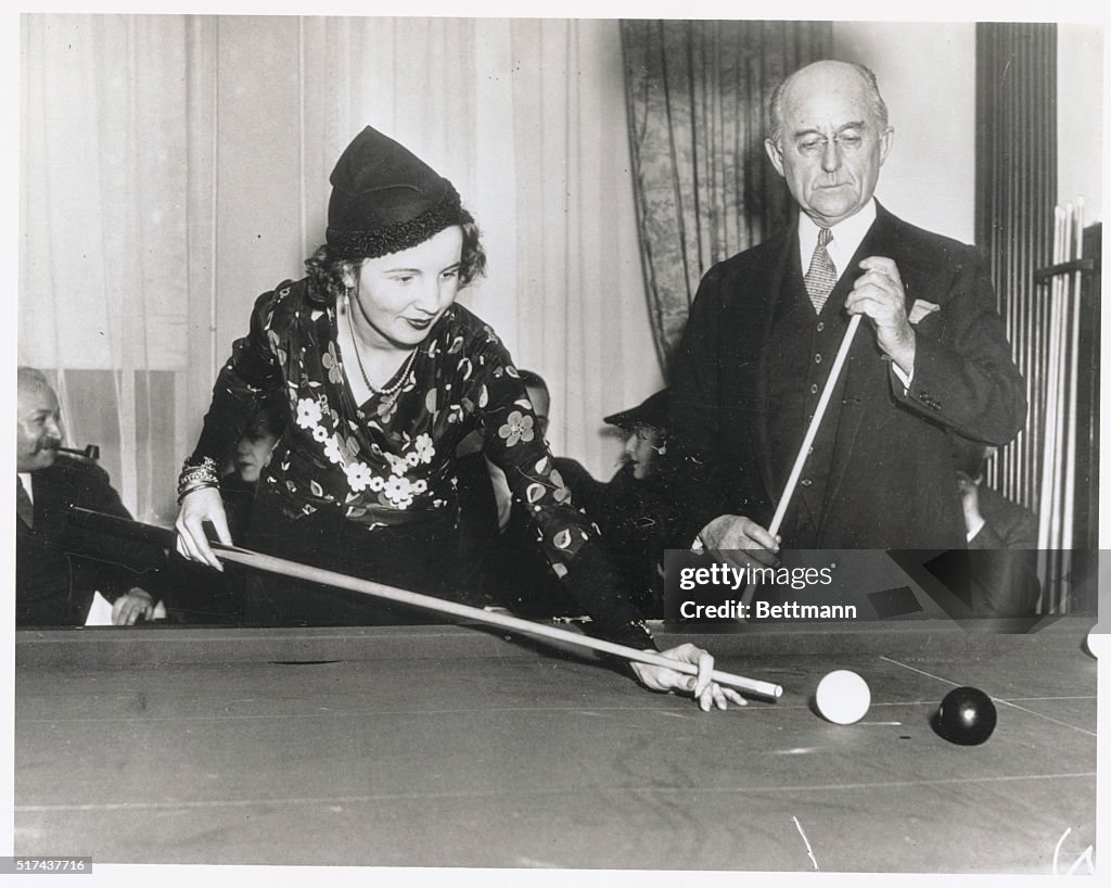 Conde Nast and Female Friend Playing Pool