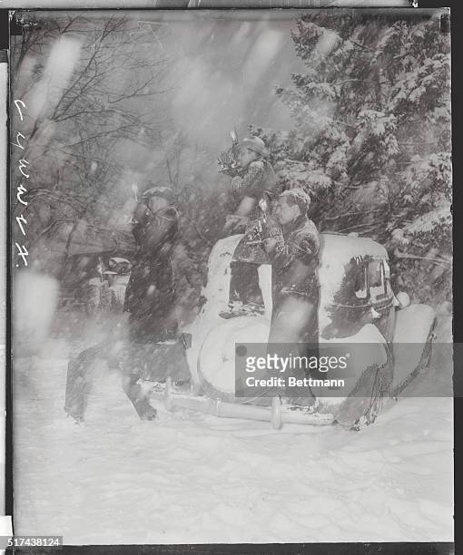Flemington, New Jersey: "Oh For The Life Of A Newspaper Photographer." The falling snow does not keep these lens-men from getting snaps of the...