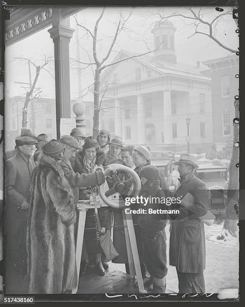 Flemington, New Jersey: Penny Merchant At Hauptmann Trial Scene. This sidewalk merchant with a press embossed a view of the Hunterdon County...