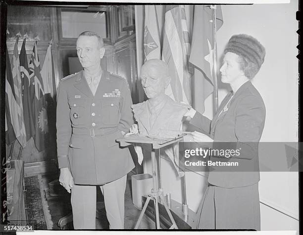Sculptor Suzanne Silvercruys works on her bust of General Jonathan M. Wainwright at Governor's Island. The work will be included in her Spring...