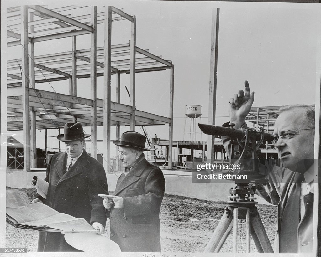 Engineers and Plant Developer on Construction Site