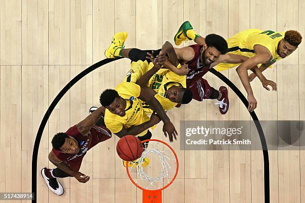 Isaiah Miles of the Saint Joseph's Hawks, Jordan Bell of the Oregon Ducks, Chris Boucher of the Oregon Ducks, DeAndre Bembry of the Saint Joseph's...