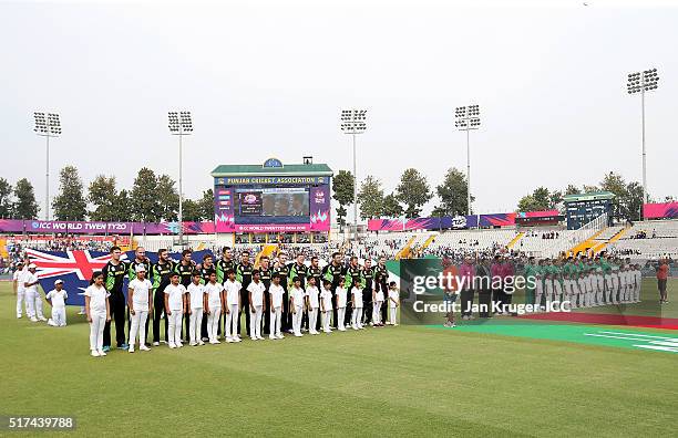 The teams line up for the national anthems ahead of the ICC World Twenty20 India 2016 Super 10s Group 2 match between Pakistan and Australia at the...