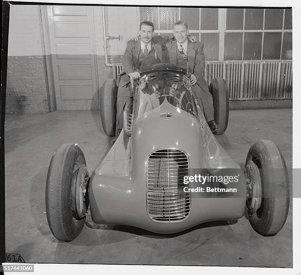 Mauri Rose , of Indianapolis, co-winner of the last 500-mile Indianapolis Speedway Classic, and Tony Bettenhausen, dirt track racer from Tinley Park,...