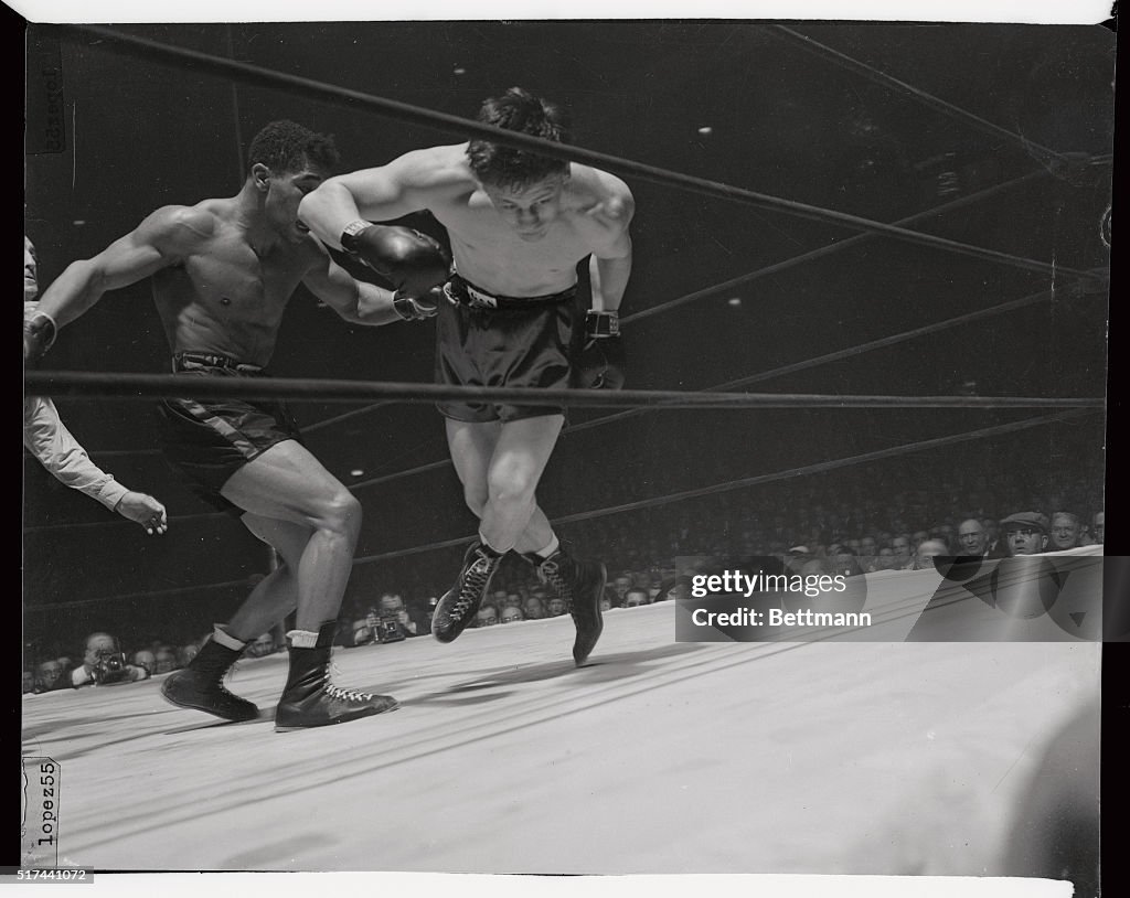 Morris Reif Falling During Bout with Beau Jack