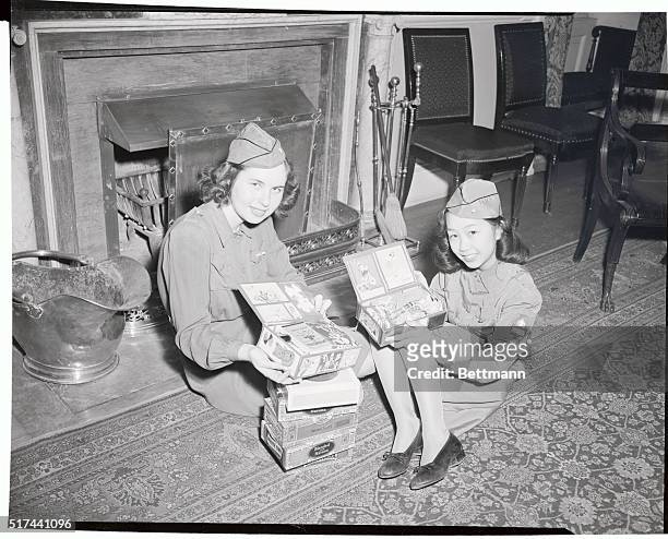 Gaily decorated cigar boxes, filled with small, inexpensive gifts for children, will be sent to youngsters in liberated nations by the children of...