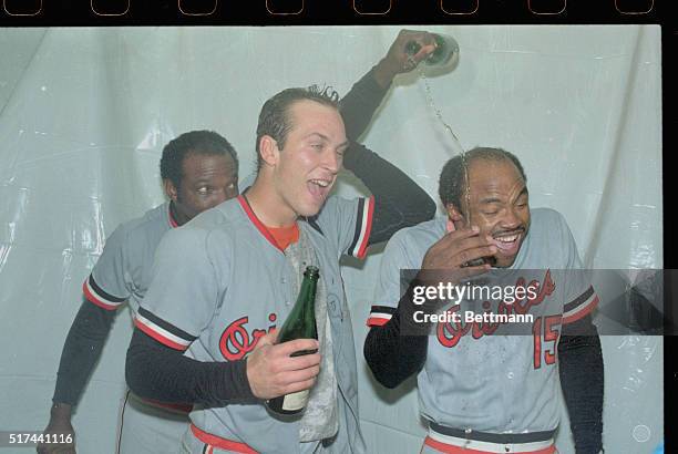 Oriole's winning pitcher Tippy Martinez jumps on catcher Rick Dempsey after the Orioles won the 1983 American League Pennant by defeating the White...