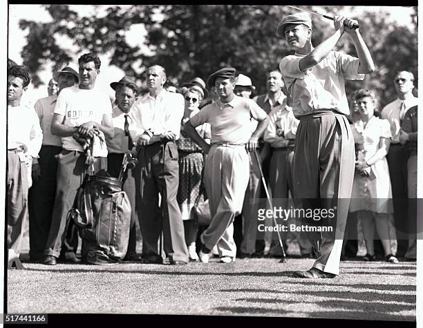 "Lord Byron" Nelson drives off the 11th hole during international match play at Winged Foot course on Decoration Day, as his opponents look on. Left...