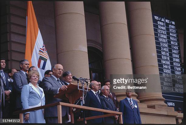 Johannesburg, South Africa: South African President P. W. Botha on Referendum Day giving a speech on the steps of the capitol. To the groups right is...