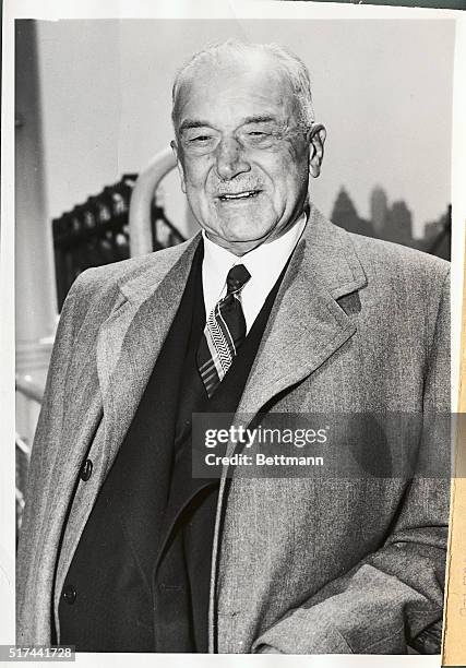 Giannini, chairman of the board of directors of the Bank of America, sails aboard the liner Queen Elizabeth to attend a meeting of the International...