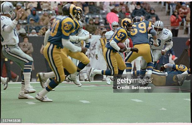 Irving, Tex.: Los Angeles Ram's Leroy Irving takes a pass from Cowboy's quarterback Danny White 94-yards to the Dallas 3-yard line during the 4th...