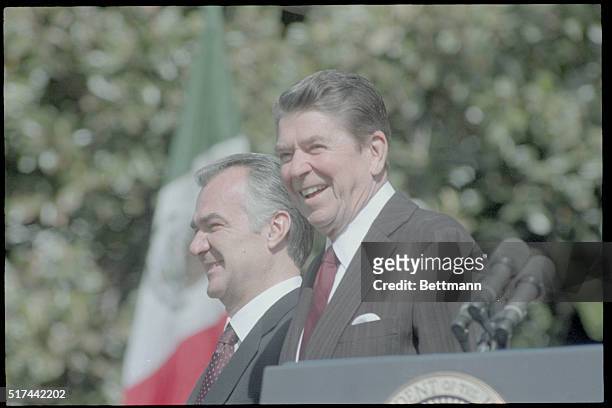 Washington, DC.: President Ronald Reagan and President Miguel De La Madrid of Mexico attend arrival ceremonies 5/15 on the South Lawn during...