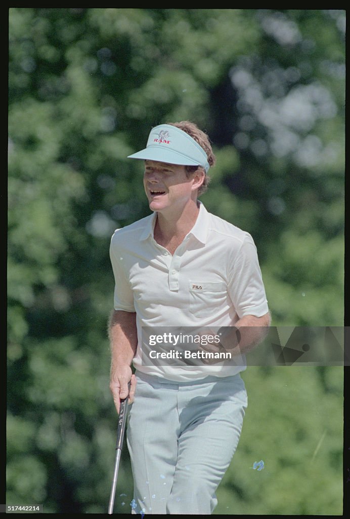 Tom Watson Eagerly Clinching His Fist on the Green