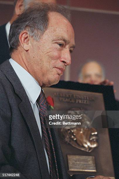 Washington: Former Canadian Prime Minister Pierre Trudeau receives the Albert Einstein Peace Prize award November 13. Trudeau received $50,000 and a...