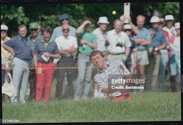 Mamaroneck, New York: Hale Irwin blasts out of a sand trap on the 5th hole in the second round of the U. S. Open in Mamaroneck, New York 6/15. Irwin...