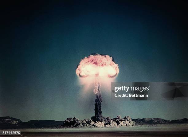 Mushroom cloud rises from a nuclear weapon test during Operation TUMBLER-SNAPPER. Over two thousand Marines witnessed the event, which was conducted...