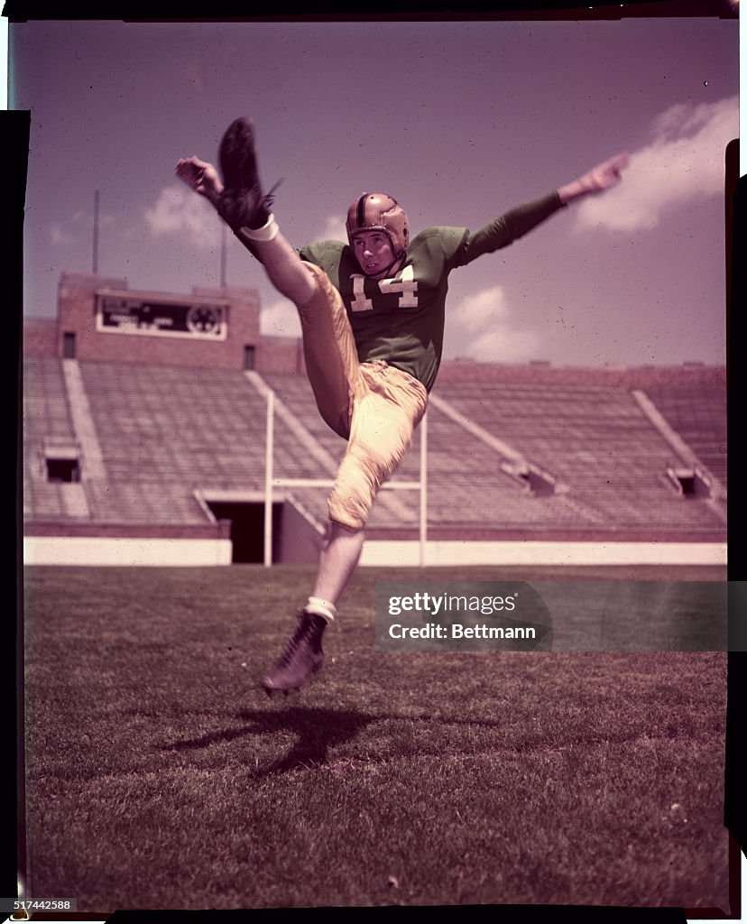 Johnny Lattner in Position for Kicking Football