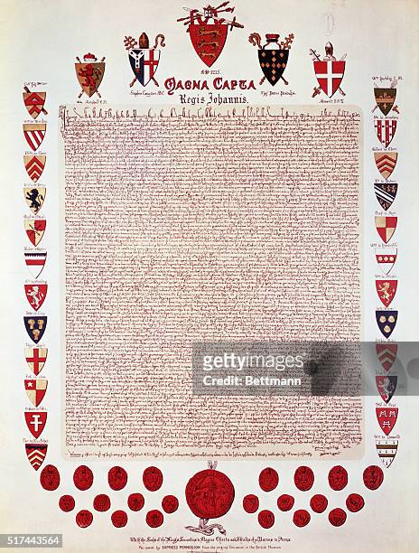 Facsimile of the Magna Carta, signed by King John of England at Runnymede, laying the basis for political and personal liberty. Barons' coats of arms...