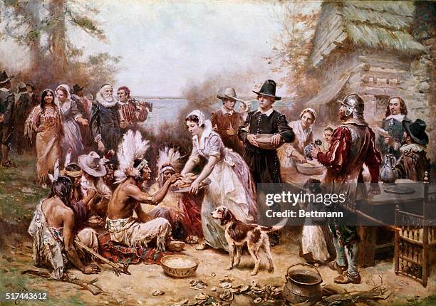 Painting by J.L.M. Ferris of the first Thanksgiving ceremony with Native Americans and the Pilgrims in 1621. Undated illustration.