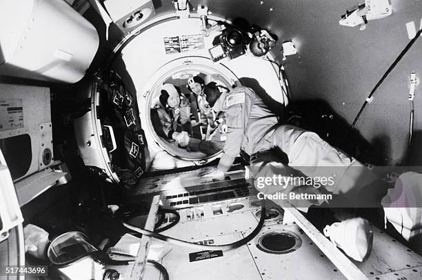 Houston, Texas- American commander Thomas Stafford shakes hands with Soviet commander Alexei Leonov during recent training exercise for Apollo-Soyuz...