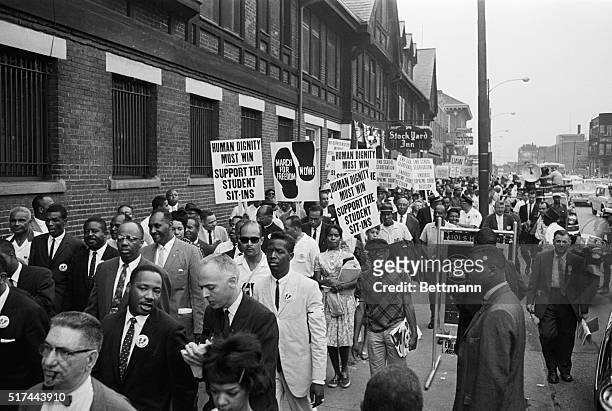 Outside the opening session of the 1960 Republican National Convention, an orderly crowd of demonstrators urges the party at adopt a strong civil...