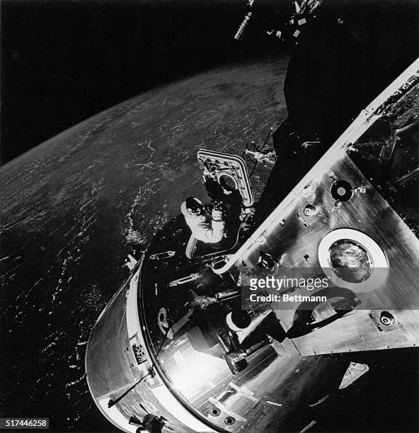 Manned Spacecraft Center, Houston, Texas: An excellent view of the docked Apollo 9 Command/Service Module and the Lunar Module, "Spider," with Earth...
