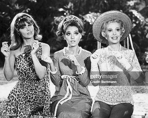From left to right, Ginger , Mary Ann , and Mrs. Howell in a scene from the 1960s television comedy Gilligan's Island. 1964-1967